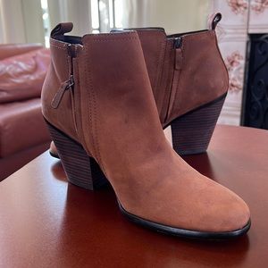 Nubuck booties never worn. Tried on and true to size.Good for work or with jeans